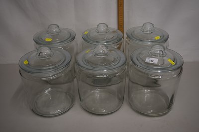 Lot 107 - A group of six clear glass kitchen storage jars