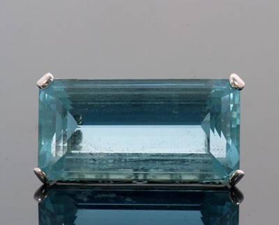 Lot 406 - An aquamarine brooch, the rectangular emerald...