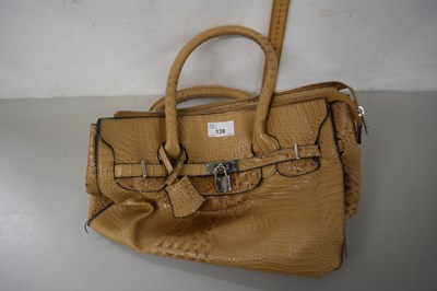 Lot 139 - A simulated crocodile skin handbag