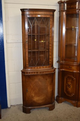 Lot 173 - A mahogany finish corner display cabinet