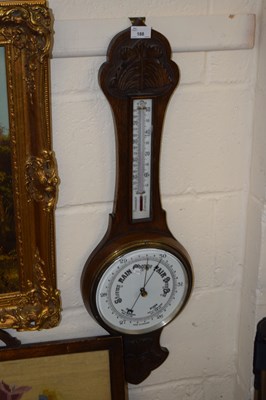 Lot 188 - A late Victorian oak cased barometer