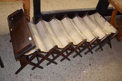 Lot 197 - A folding wooden framed camp bed