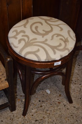 Lot 207 - A bentwood framed circular topped stool