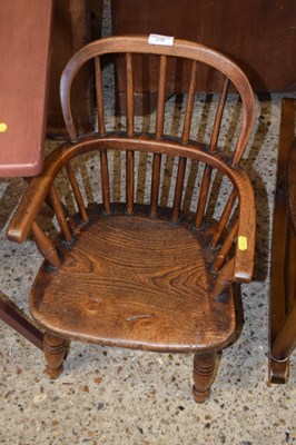 Lot 210 - Small child's elm seated Windsor type chair