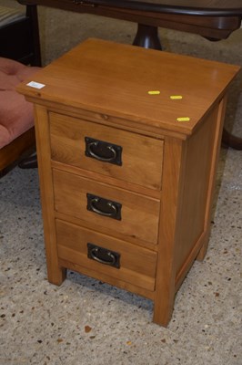 Lot 217 - Modern oak bedside cabinet