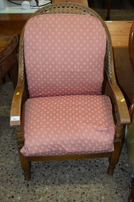 Lot 223 - An early 20th Century cane backed armchair