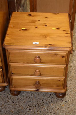 Lot 240 - Modern pine three drawer bedside cabinet