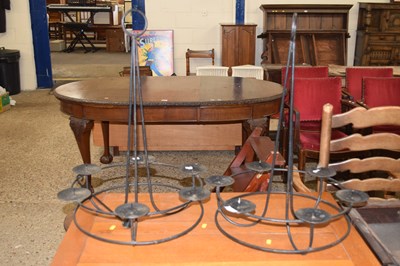 Lot 242 - Pair of iron hanging candelabras