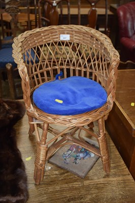 Lot 247 - A child's wicker chair