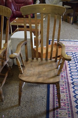 Lot 252 - A Victorian elm seated Windsor chair