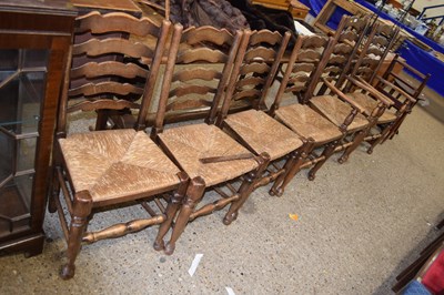 Lot 262 - Set of six ladder back rush seated kitchen chairs