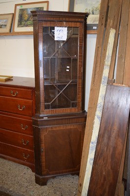 Lot 296 - A reproduction mahogany corner cabinet