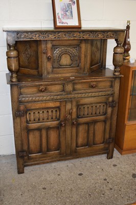 Lot 303 - Reproduction oak court cupboard with carved...