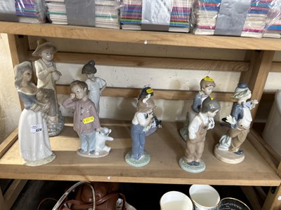 Lot 626 - Group of Nao and other similar figurines