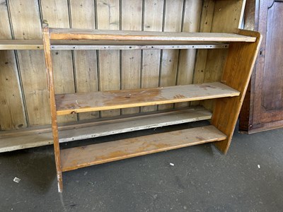 Lot 677 - A pine wall shelf