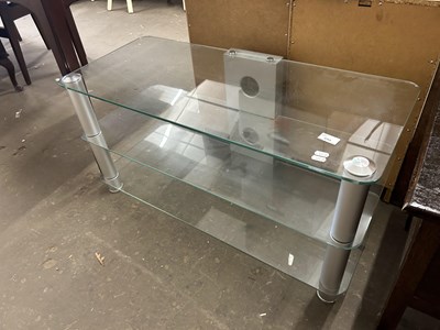 Lot 694 - Glass television stand