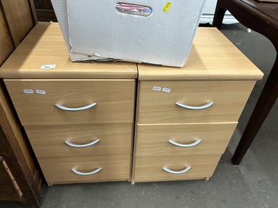 Lot 697 - Pair of light wood bedside cabinets