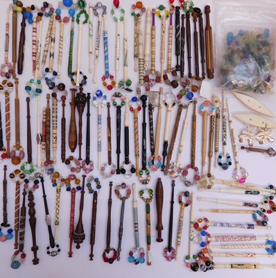 Lot 177 - A quantity of lace bobbins, to include bone,...