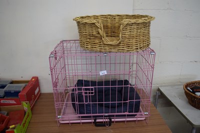 Lot 1010 - A dog crate together with a wicker dog basket