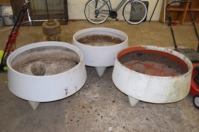 Lot 1042 - Three large plastic planters