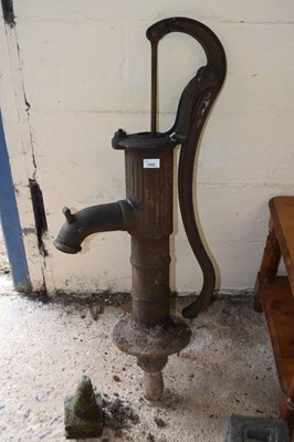 Lot 1052 - Cast iron water pump together with some...