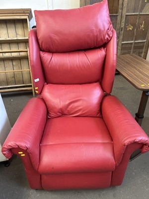 Lot 683 - A red leather upholstered electric recliner...