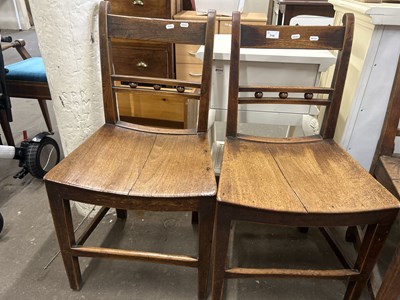 Lot 719 - A pair of 19th Century hard seated kitchen chairs