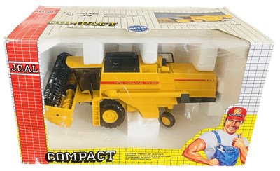 Lot 129 - A boxed Joal New Holland TX34 Combine Harvester