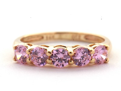 Lot 71 - A 14ct pink CZ ring, set with five round pink...