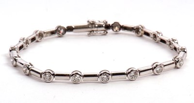 Lot 70 - An 18ct white gold and diamond bracelet, set...