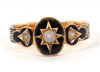 Lot 54 - A 19th century mourning ring, the central oval...