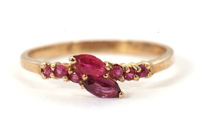 Lot 59 - A 9ct ruby ring, set with two overlapping...