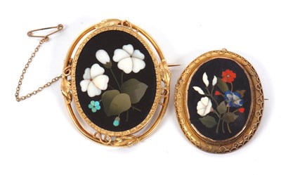 Lot 314 - Two pietra dura brooches: the larger with...