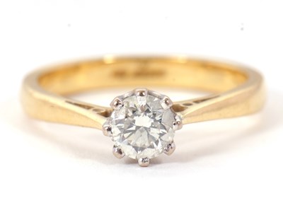 Lot 73 - An 18ct diamond solitaire ring, the round...