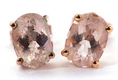 Lot 180 - A pair of 9ct morganite earstuds, the oval...