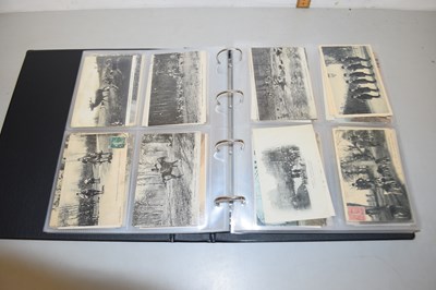 Lot 96 - An album of assorted postcards to include...