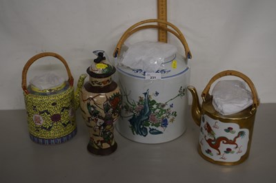 Lot 231 - A large Chinese porcelain kettle with a...