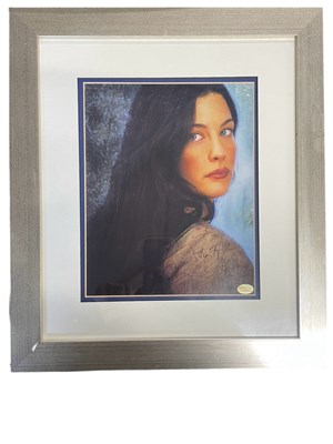 Lot 82 - A framed and glazed colour photograph bearing...