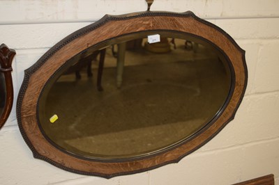 Lot 277 - Oval oak framed wall mirror