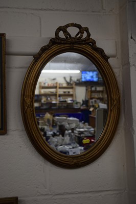 Lot 285 - Oval gilt framed wall mirror