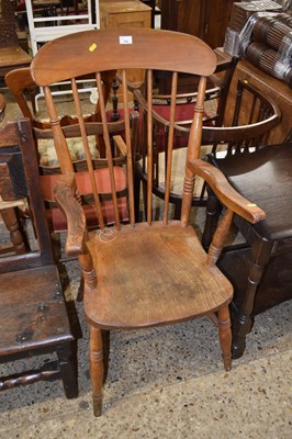 Lot 324 - A pine stick back chair