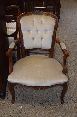 Lot 335 - A button back upholstered elbow chair