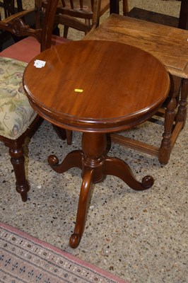 Lot 352 - A reproduction mahogany round tripod table