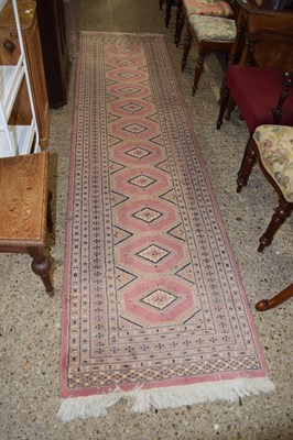 Lot 353 - A pink ground runner