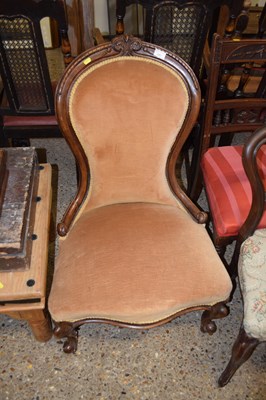 Lot 393 - A mahogany framed shield back low chair