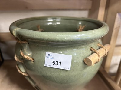 Lot 531 - A green glazed plant pot and a wooden model of...