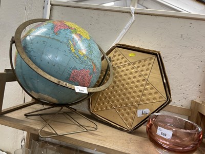 Lot 640 - A globe on stand together with a wooden...