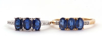 Lot 82 - Two 9ct kyanite rings: one set with three oval...