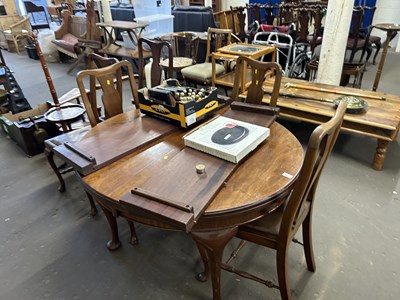 Lot 804 - A mahogany oval extending dining table with...