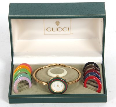 Lot 243 - A Gucci 11/12 ladies wristwatch, Quartz...